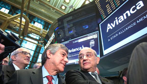 The CEO of Avianca Fabio Villegas Ramirez ( L) celebrates their IPO at the New York Stock Exchange in New York, November 6, 2013. Carlo Allegri/NYSE EURONEXT
